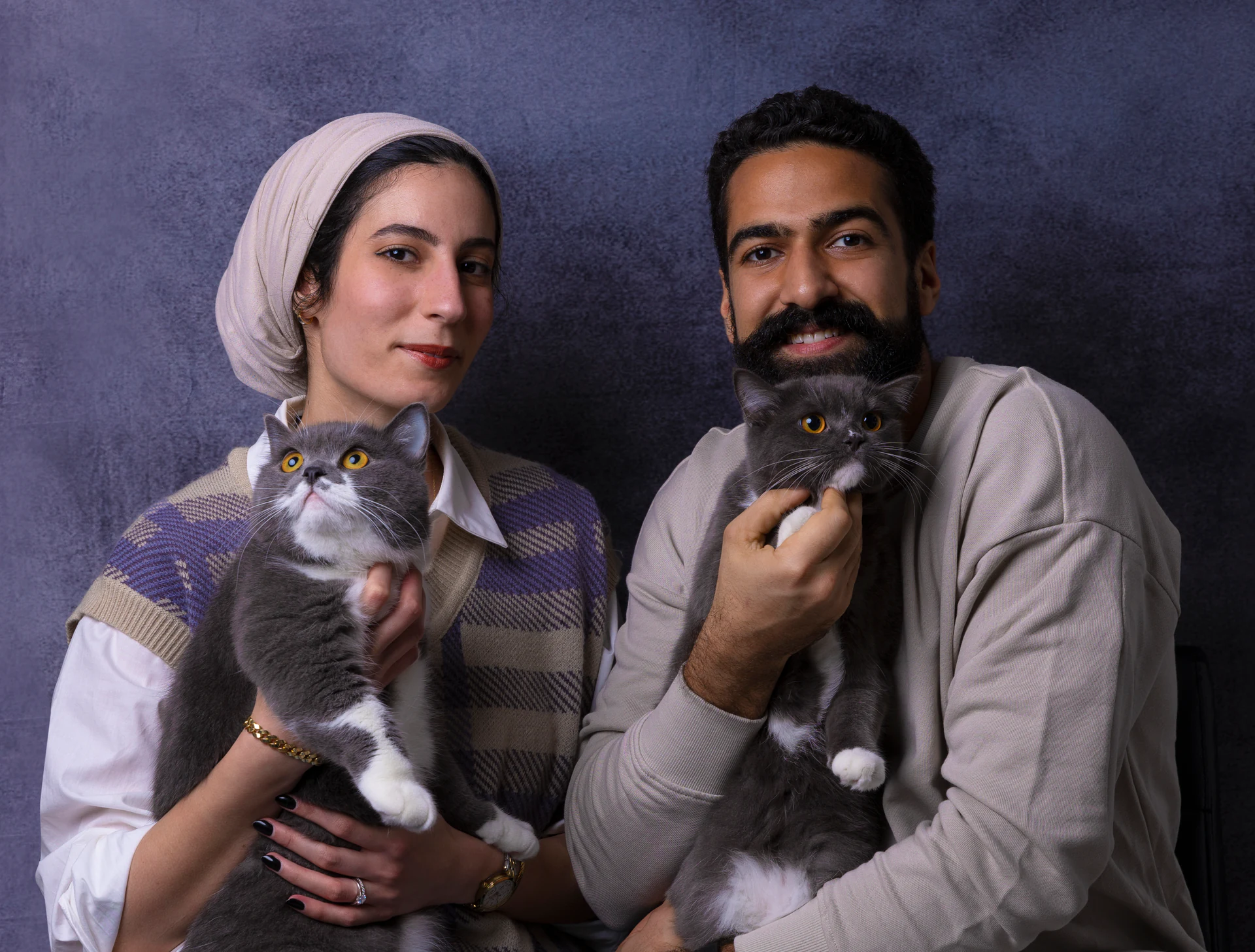 Flomaru’s founders, Ali and Amal, with their cats